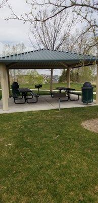 Pavilion with charcoal grill pit and benches