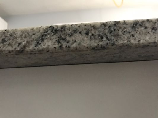 Granite slab unattached to the cabinets