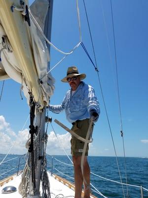 Captain Gary raising the sail