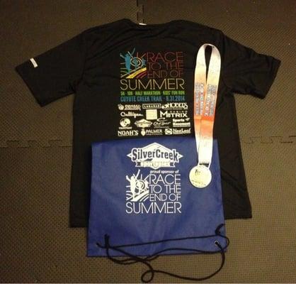 dri fit race shirt, drawstring bag and finisher medal