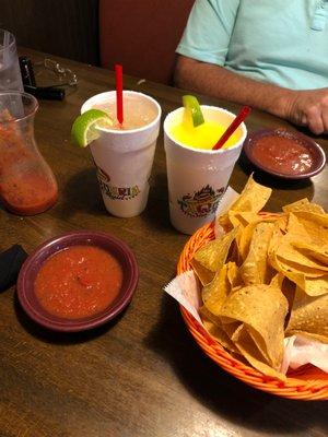 Happy hour margaritas, chips and salsa