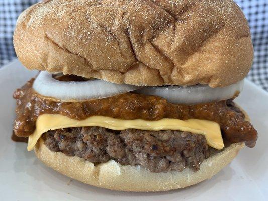 CHILI CHEESEBURGER- 1/3 lb Angus Beef Burger, fresh Chili and American Cheese all snuggled together in a bakery bun.