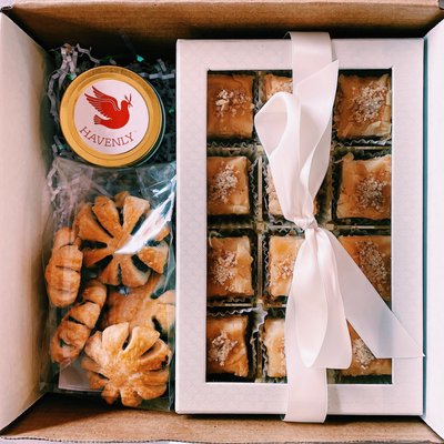 Our gift boxes bring joy to your loved ones and our community. Personalize as you wish!