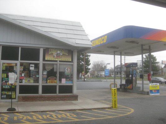 sunoco from the pumps, bathrooms next door 25 y to the left