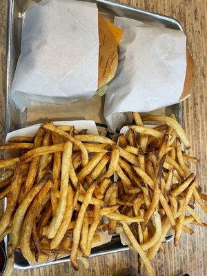 Impossible Burger and 100% Grass-Fed, Organic Beef Cheeseburger and two Elevation Fries.