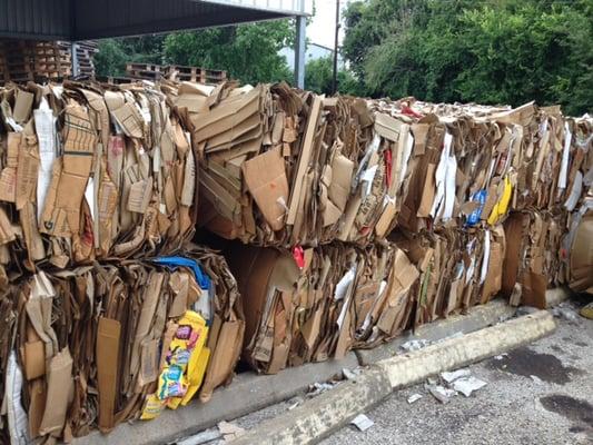 We pick up many forms of recycling materials including bales like these cardboard bales. Also plastics and metals loose or boxed.