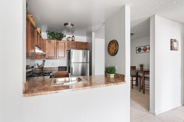 Fully equipped kitchens & dedicated dining areas at Rivercrest apartments in Melbourne FL