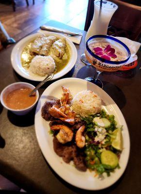 Green chili shrimp Enchiladas, steak and shrimp with rice, beans, side salad and homemade corn tortillas. Pina colada and guava margarita