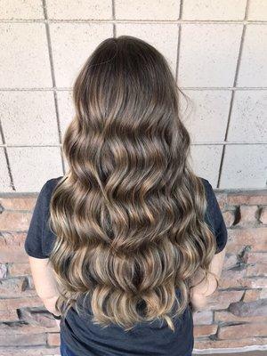 Long layered cut with beautiful waves.