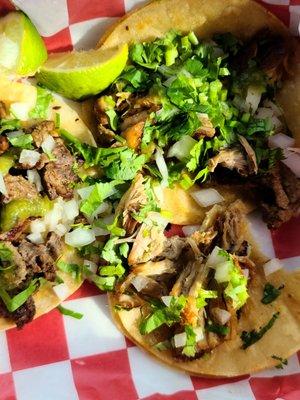 Carne asada and carnitas tacos