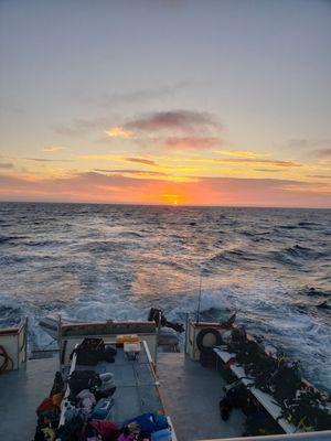 Sunset off her stern at San Miguel.