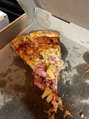 Only the bottom parts had the ham and pineapple! It's like they throw things on a pizza without looking and throw it in the oven !