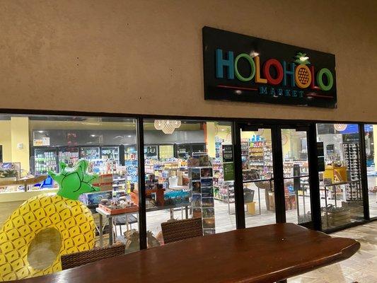 Entrance from the main open area and swimming pools - Holoholo Market & Cafe