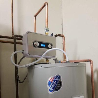 Tank Booster installed on electric water heater.