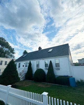 New Roof with new white seamless gutters!