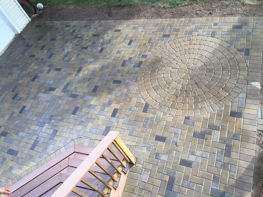 Circle packs and contrasting colors contribute to the look of your new patio.