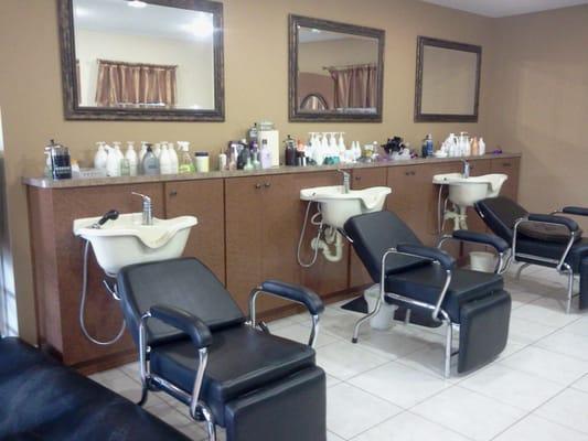 Custom built laminate shampoo stations at Cut Loose Salon.  All American Cabinetry, Inc.  Ocala, FL