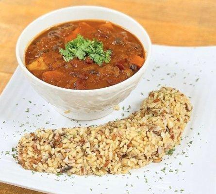 The Curesader Chili made with black and red kidney beans, tomato sauce, jalapeno peppers, carrots, and red onion.  Served with wild brown ri