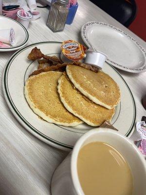 Pancakes, bacon and great tasting coffee.