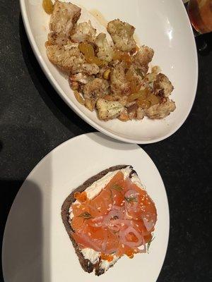 On the 5th floor of the Guthrie. Zatar seasoned cauliflower on yogurt and smoked salmon on rye with dill and salmon roe. Delish!