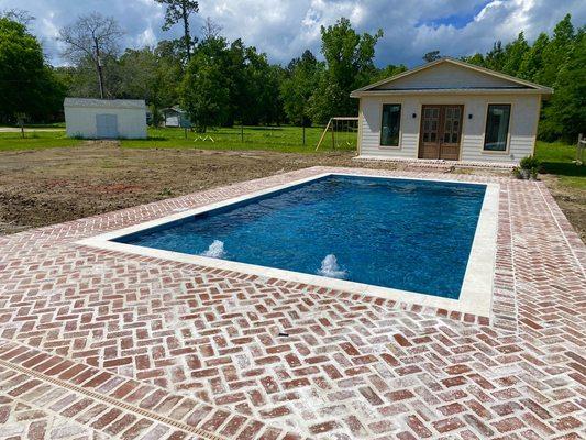 pool with 2 bubblers and old St. Louis brick pavers around pool