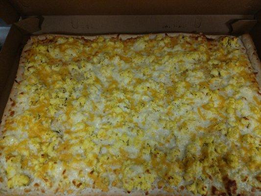 Egg and cheese breakfast pizza!!   ... available in round or sheet...    ...please give 1 day notice for ordering!!