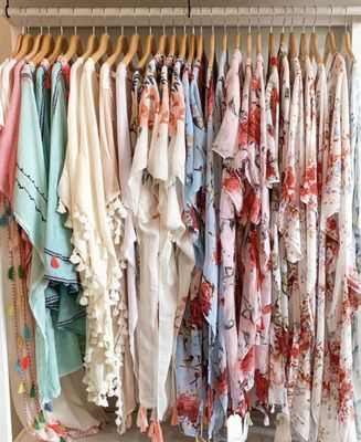 Lots of seasonal clothing. Coverups and sundresses in summer, sweaters and cozy knits in winter!