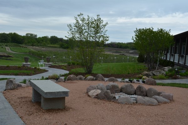 Crushed Granite Seating Area with Boulder Wall and Firepit.  Kuiper Family Farm, Elburn IL