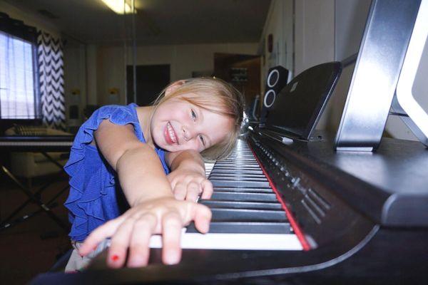 Piano student smiling! Glendora Music and Arts School