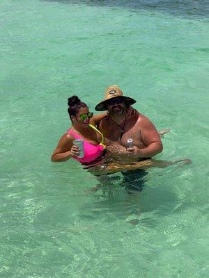 Couple enjoying their time at the sandbar