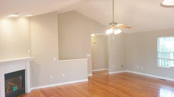 This Great  room took two coats to cover over scuffed, dingy walls and trim.