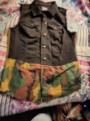 Thus was a vest that I had purchased and I gave them some material to add to the vest and I am so happy  at the outcome.