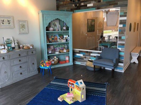 Our reception and retail area - little kids love to play with the toys on display!