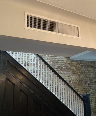 Ductless unit manufactured to look like a duct register.  The ease of ductless and the look of ducted central air!