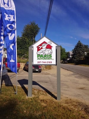 Sign at Paris Autobarn LLC designed and installed by Swett signs. Logo by Zizi Vlaun at Moose Pond Arts+Ecology.