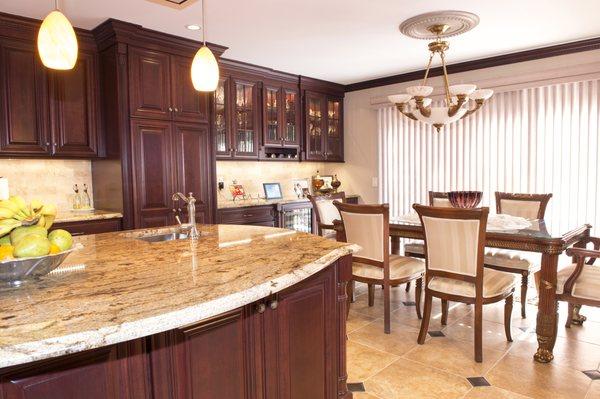 Rich cherry cabinetry with imported granite counter tops