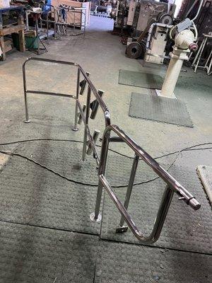 Stainless Steel hand railing with rod holders.