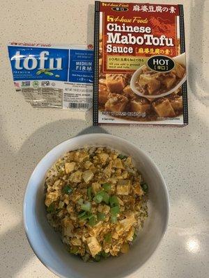 This dish is Mapo Tofu with ground pork over rice. It's spicy and delicious