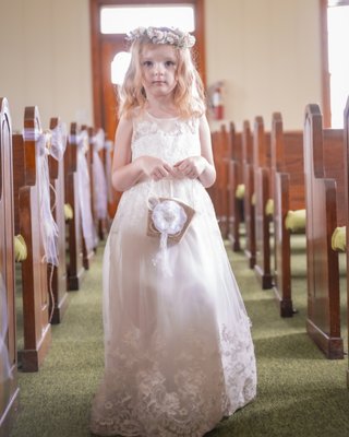 Beautiful flower girl from a simple country wedding