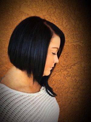 Asymmetrical stylish Haircut by Michelle