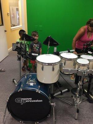 Trying out the electric drums