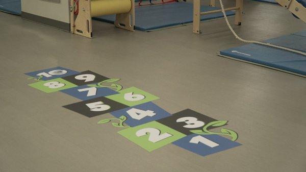 Hopscotch floor graphics in treatment area