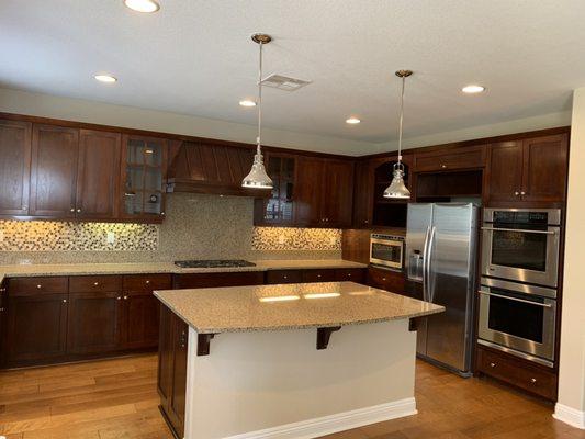 After finishing the staining and sealing with lacquer kitchen cabinets.