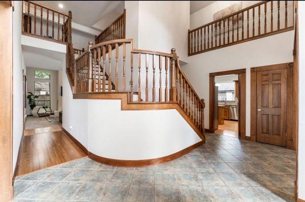 Foyer with modified staircase.