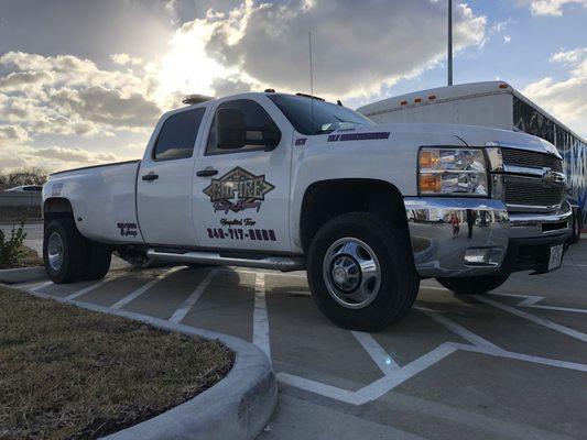 Finished.  Logo brought to life and installed on clients tow truck.  Same day print and installation on ultra metallic silver.