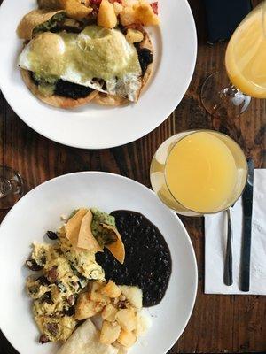 Huevos rancheros, huevos con chorizo, and mimosas.