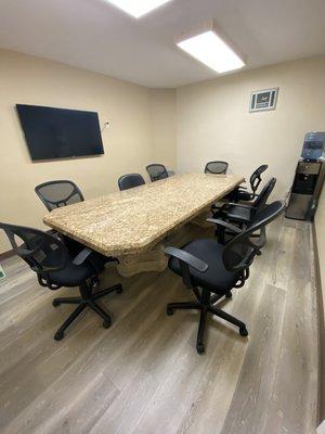 Our conference room table where we notarize your documents.