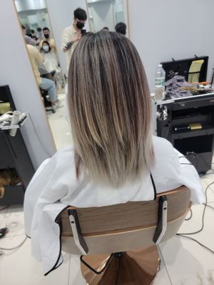 Ashe blonde balayage done by Eric Dong