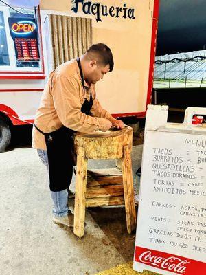 He uses the wooden "stool" to clean his cooking utensils! Smart! And cool looking!