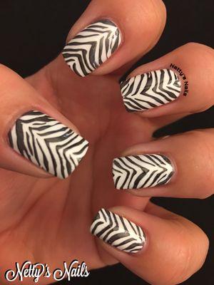 Zebra print gel manicure.